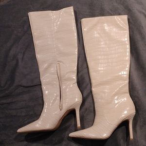 Cream knee high boots
